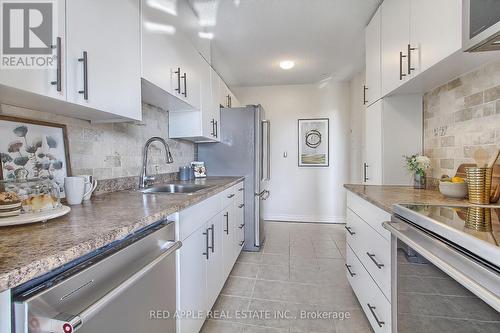 407 - 1210 Radom Street, Pickering, ON - Indoor Photo Showing Kitchen