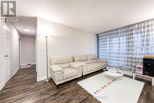 1612 - 100 Wingarden Court, Toronto, ON - Indoor Photo Showing Living Room With Fireplace