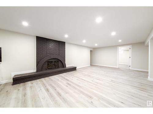 784 Lee Ridge Rd Nw, Edmonton, AB - Indoor Photo Showing Other Room With Fireplace