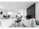 784 Lee Ridge Rd Nw, Edmonton, AB  - Indoor Photo Showing Living Room With Fireplace 