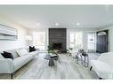 784 Lee Ridge Rd Nw, Edmonton, AB  - Indoor Photo Showing Living Room With Fireplace 