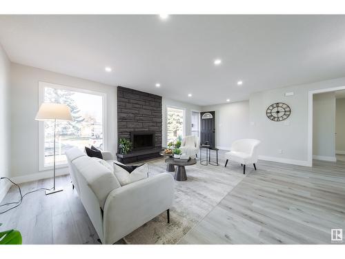 784 Lee Ridge Rd Nw, Edmonton, AB - Indoor Photo Showing Living Room With Fireplace