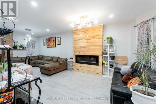 55 Francis Street, Hamilton, ON - Indoor Photo Showing Living Room With Fireplace