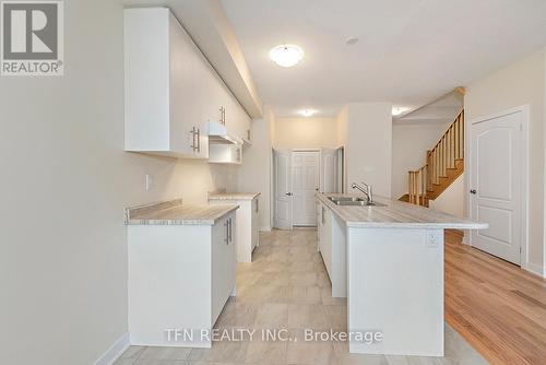 132 Eastbridge Avenue, Welland, ON - Indoor Photo Showing Kitchen With Double Sink