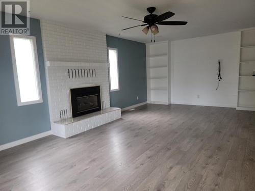 550 Palmer Street, Quesnel, BC - Indoor Photo Showing Living Room With Fireplace