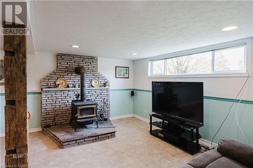 Rec room - 2455 Highway 9, Brockton, ON - Indoor Photo Showing Living Room With Fireplace