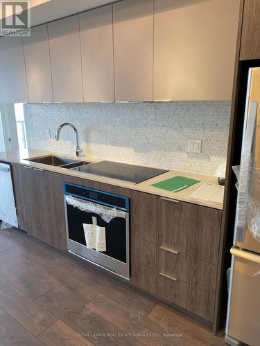 1003 - 2 Sonic Way, Toronto, ON - Indoor Photo Showing Kitchen With Double Sink