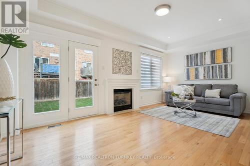 334 William Dunn Crescent, Newmarket, ON - Indoor Photo Showing Living Room With Fireplace