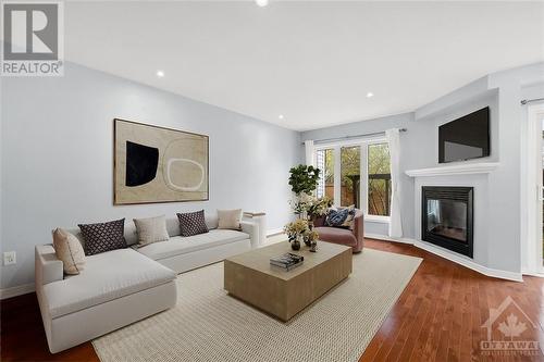 Virtually Staged - 326 Statewood Drive, Kanata, ON - Indoor Photo Showing Living Room With Fireplace