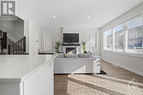 124 Jardiniere Street, Stittsville, ON - Indoor Photo Showing Living Room With Fireplace