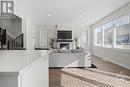 124 Jardiniere Street, Stittsville, ON  - Indoor Photo Showing Living Room With Fireplace 