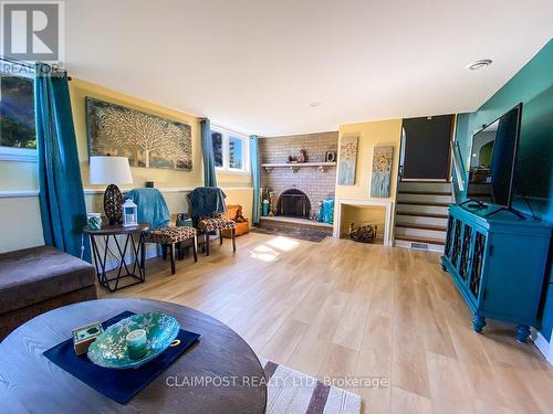 9525 Highway 11, Iroquois Falls, ON - Indoor Photo Showing Living Room With Fireplace