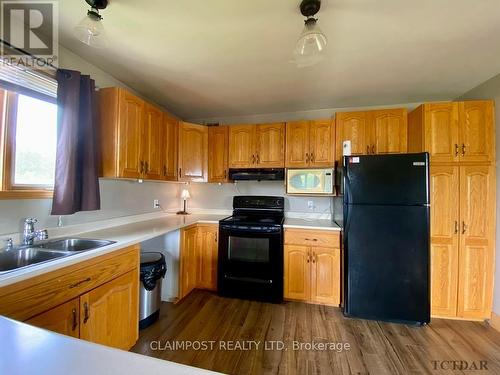 2342 Monteith Road, Iroquois Falls, ON - Indoor Photo Showing Kitchen With Double Sink