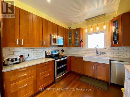 149 Essex Avenue, Iroquois Falls, ON - Indoor Photo Showing Kitchen With Double Sink