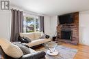 3181 Harmony Drive, Windsor, ON  - Indoor Photo Showing Living Room With Fireplace 