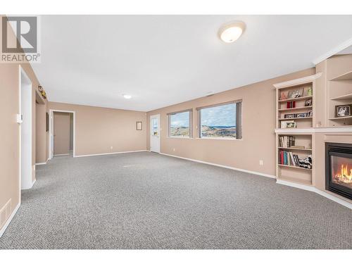 124 Sarsons Road Unit# 85, Vernon, BC - Indoor With Fireplace