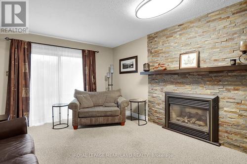 15 Chalfont Road, London, ON - Indoor Photo Showing Living Room With Fireplace