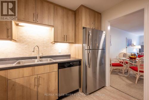 209 - 26 Spencer Street E, Cobourg, ON - Indoor Photo Showing Kitchen With Stainless Steel Kitchen With Double Sink