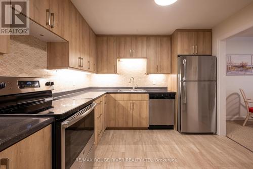 209 - 26 Spencer Street E, Cobourg, ON - Indoor Photo Showing Kitchen With Stainless Steel Kitchen With Double Sink