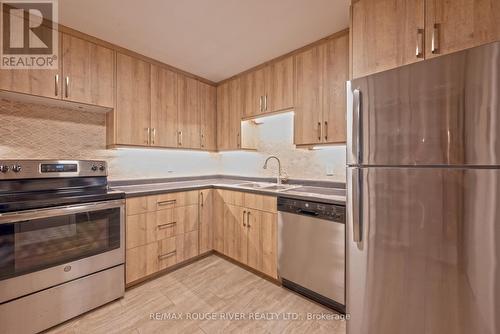 209 - 26 Spencer Street E, Cobourg, ON - Indoor Photo Showing Kitchen With Stainless Steel Kitchen