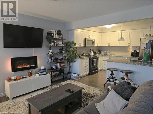 145 Hollybrook Trail, Kitchener, ON - Indoor Photo Showing Kitchen With Fireplace