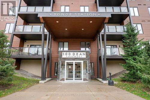 214 - 100 Dean Avenue, Barrie, ON - Outdoor With Balcony With Facade