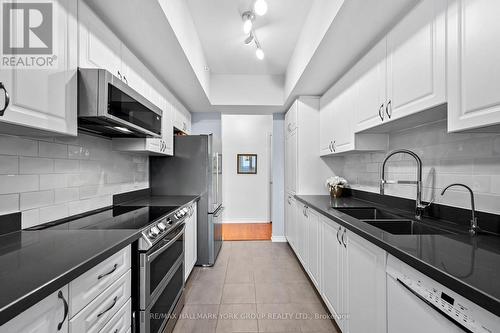 214 - 100 Dean Avenue, Barrie, ON - Indoor Photo Showing Kitchen With Double Sink