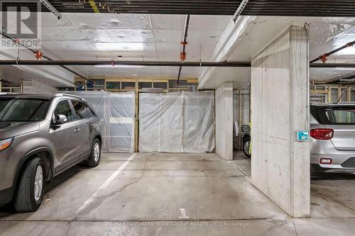 214 - 100 Dean Avenue, Barrie, ON - Indoor Photo Showing Garage