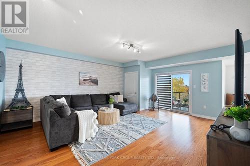 214 - 100 Dean Avenue, Barrie, ON - Indoor Photo Showing Living Room