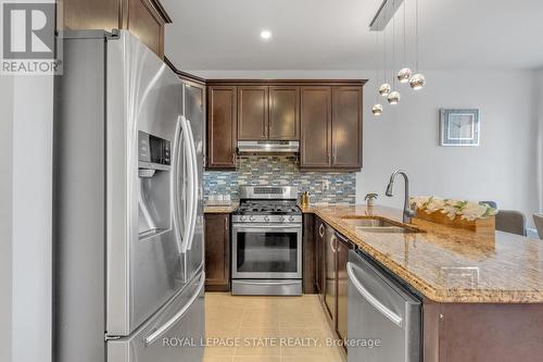 1519 Farmstead Drive, Milton, ON - Indoor Photo Showing Kitchen With Stainless Steel Kitchen With Double Sink With Upgraded Kitchen