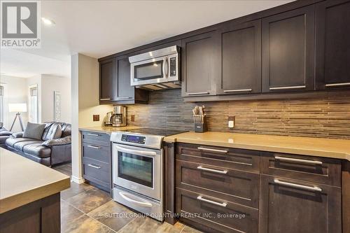 218 - 120 Fairway Court, Blue Mountains, ON - Indoor Photo Showing Kitchen