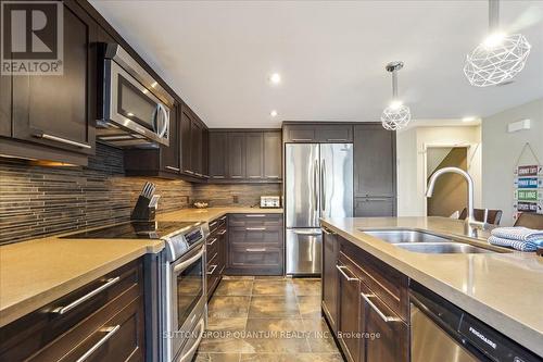 218 - 120 Fairway Court, Blue Mountains, ON - Indoor Photo Showing Kitchen With Double Sink With Upgraded Kitchen