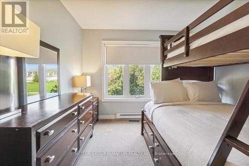 218 - 120 Fairway Court, Blue Mountains, ON - Indoor Photo Showing Bedroom