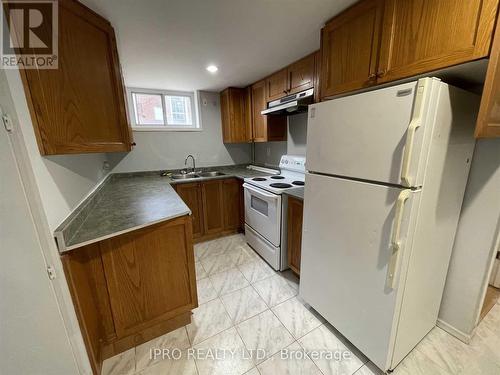 Bsmt - 26 Frolick Crescent, Toronto, ON - Indoor Photo Showing Kitchen With Double Sink