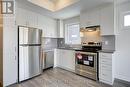 329 - 2787 Eglinton Avenue E, Toronto, ON  - Indoor Photo Showing Kitchen With Stainless Steel Kitchen 