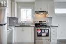 329 - 2787 Eglinton Avenue E, Toronto, ON  - Indoor Photo Showing Kitchen With Stainless Steel Kitchen 