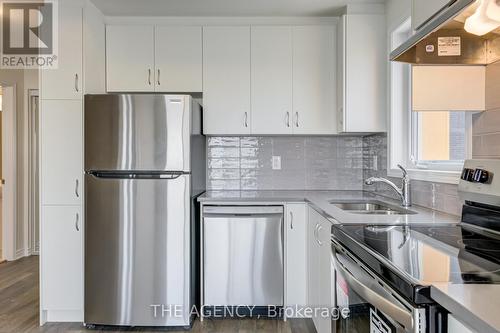 329 - 2787 Eglinton Avenue E, Toronto, ON - Indoor Photo Showing Kitchen With Stainless Steel Kitchen With Double Sink With Upgraded Kitchen