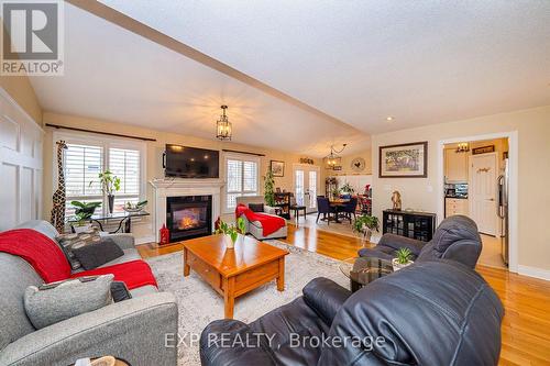 28 Thrushwood Trail, Kawartha Lakes, ON - Indoor Photo Showing Living Room With Fireplace