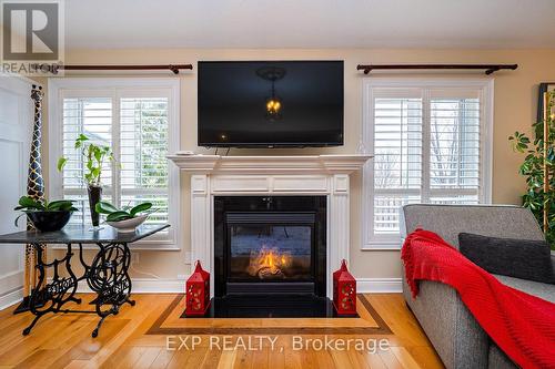 28 Thrushwood Trail, Kawartha Lakes, ON - Indoor Photo Showing Living Room With Fireplace