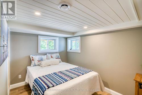 1039 West Cottage Drive W, North Frontenac, ON - Indoor Photo Showing Bedroom