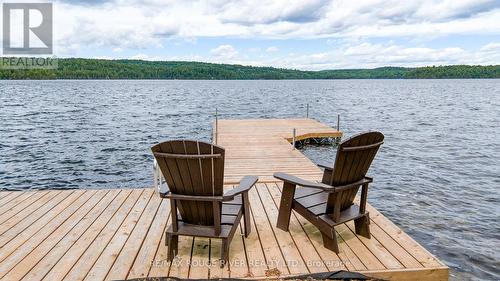 1039 West Cottage Drive W, North Frontenac, ON - Outdoor With Body Of Water With Deck Patio Veranda