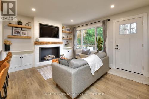 495 Elm Avenue N, North Perth, ON - Indoor Photo Showing Living Room With Fireplace