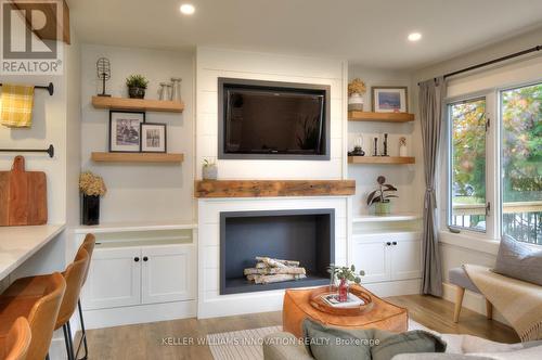 495 Elm Avenue N, North Perth, ON - Indoor Photo Showing Living Room With Fireplace