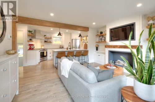 495 Elm Avenue N, North Perth, ON - Indoor Photo Showing Living Room With Fireplace