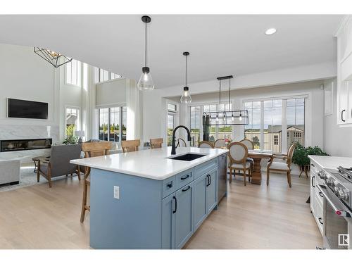 6842 Knox Lo Sw, Edmonton, AB - Indoor Photo Showing Kitchen With Fireplace With Upgraded Kitchen