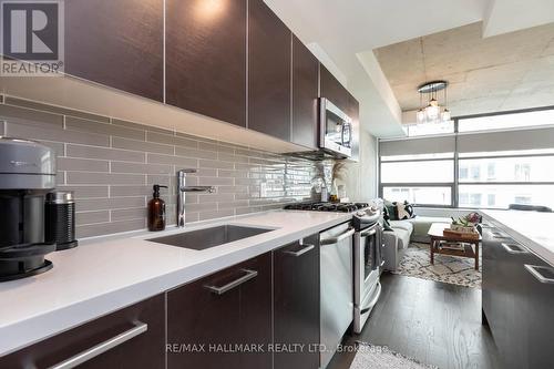 407 - 1201 Dundas Street E, Toronto, ON - Indoor Photo Showing Kitchen With Upgraded Kitchen