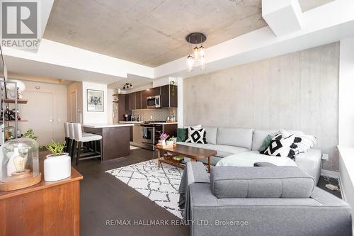 407 - 1201 Dundas Street E, Toronto, ON - Indoor Photo Showing Living Room