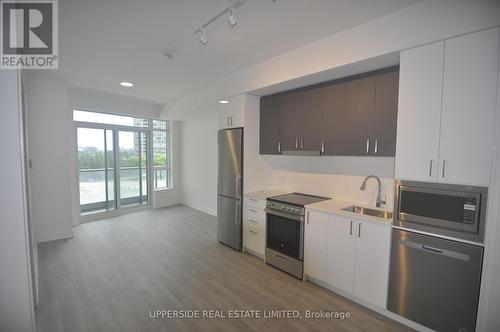 A304 - 30 Upper Mall Way, Vaughan, ON - Indoor Photo Showing Kitchen