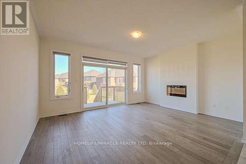 8 Beatrice Drive, Wasaga Beach, ON - Indoor Photo Showing Living Room With Fireplace