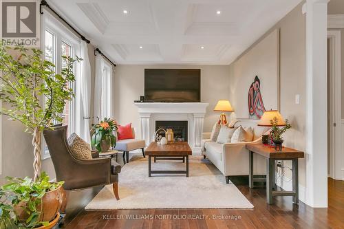 75 Ashbourne Drive, Toronto, ON - Indoor Photo Showing Living Room With Fireplace